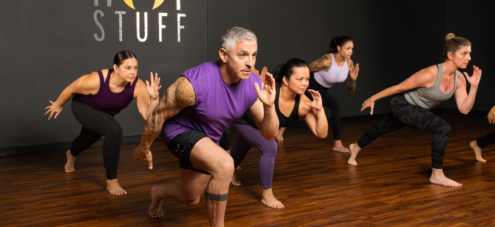 people in hot athlete class at crunch fitness