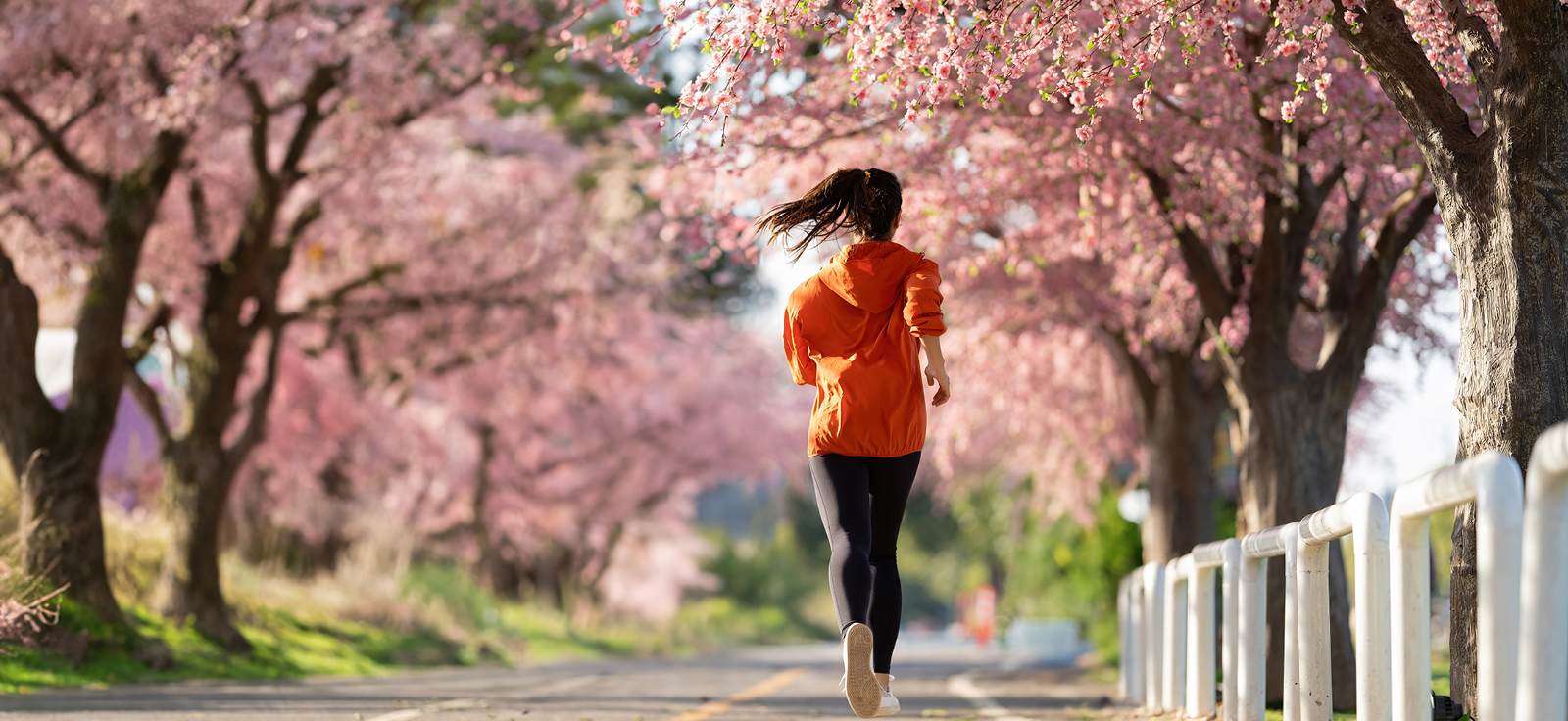 woman running during spring time