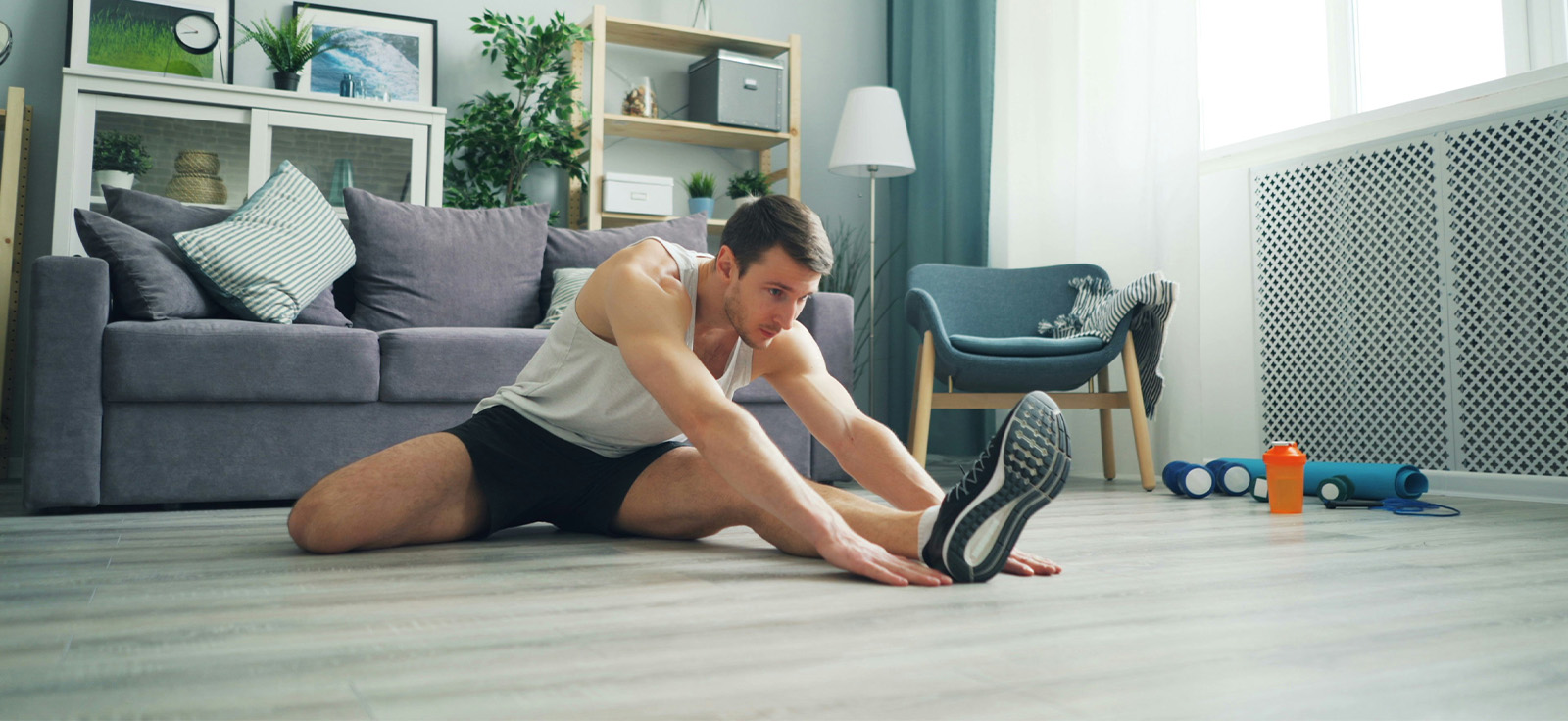 Person stretching at home